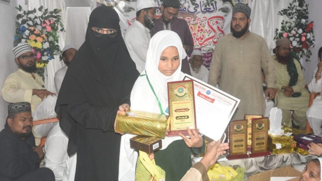 Student receiving first position award
